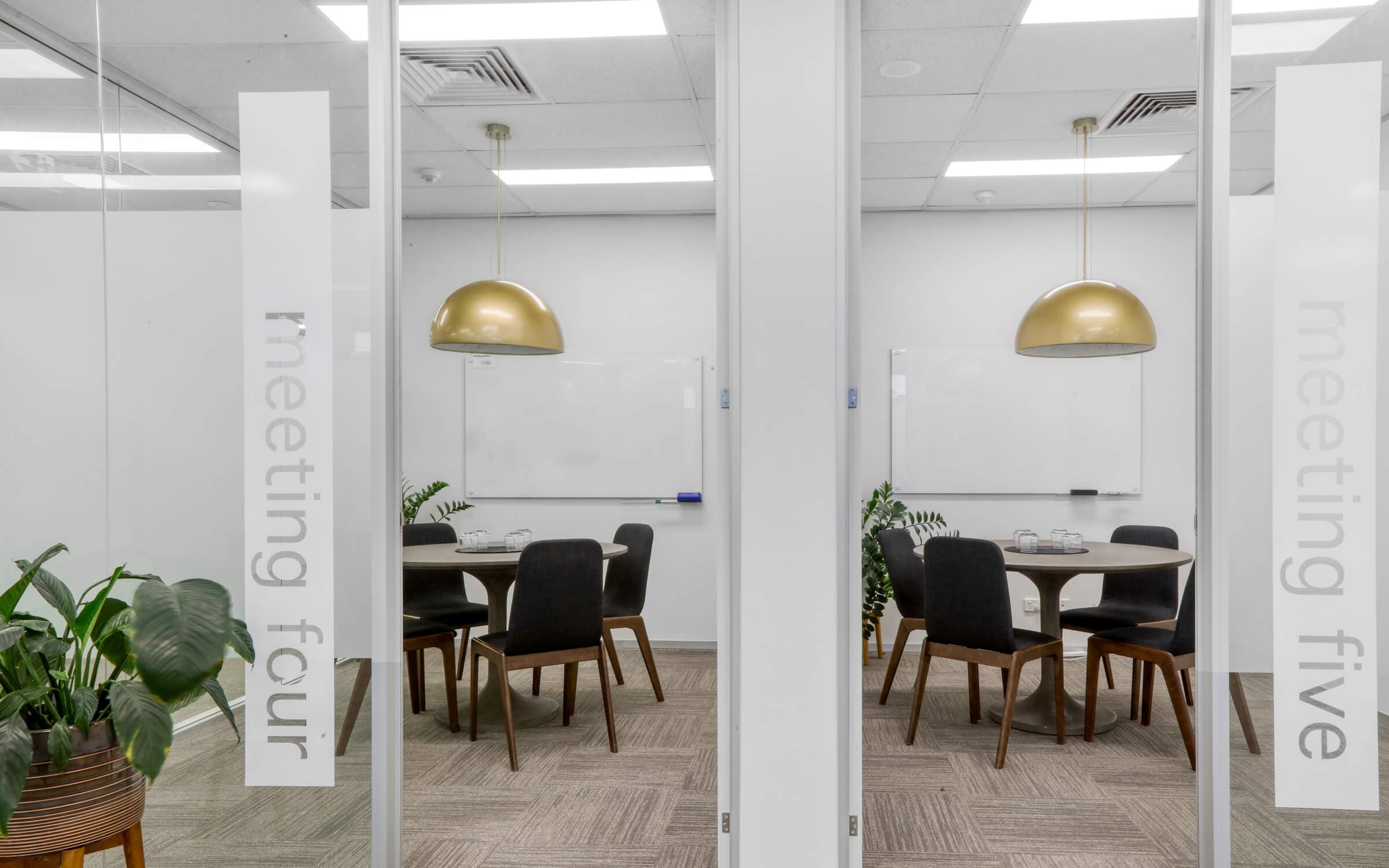 Meeting Rooms 4 and 5 at 1024 Ann Street in Fortitude Valley, Queensland. Each meeting room can accommodate up to 4 people.
