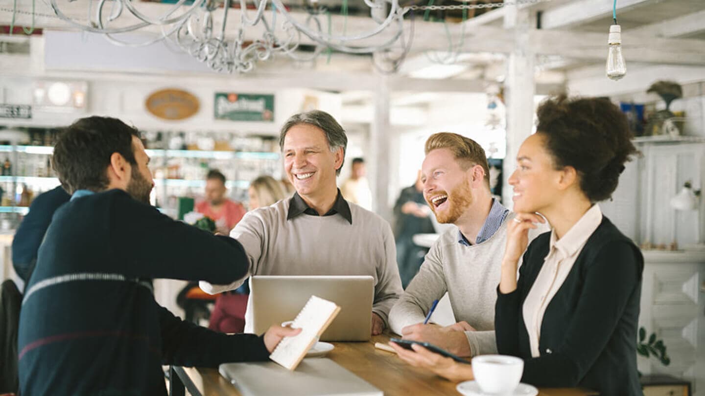 Business executives utilising shared co-working envrionment